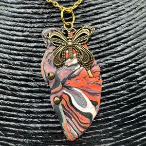 Butterfly Pendant Necklace with Multicolor Swirl Design